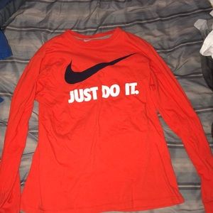 Orange Nike shirt